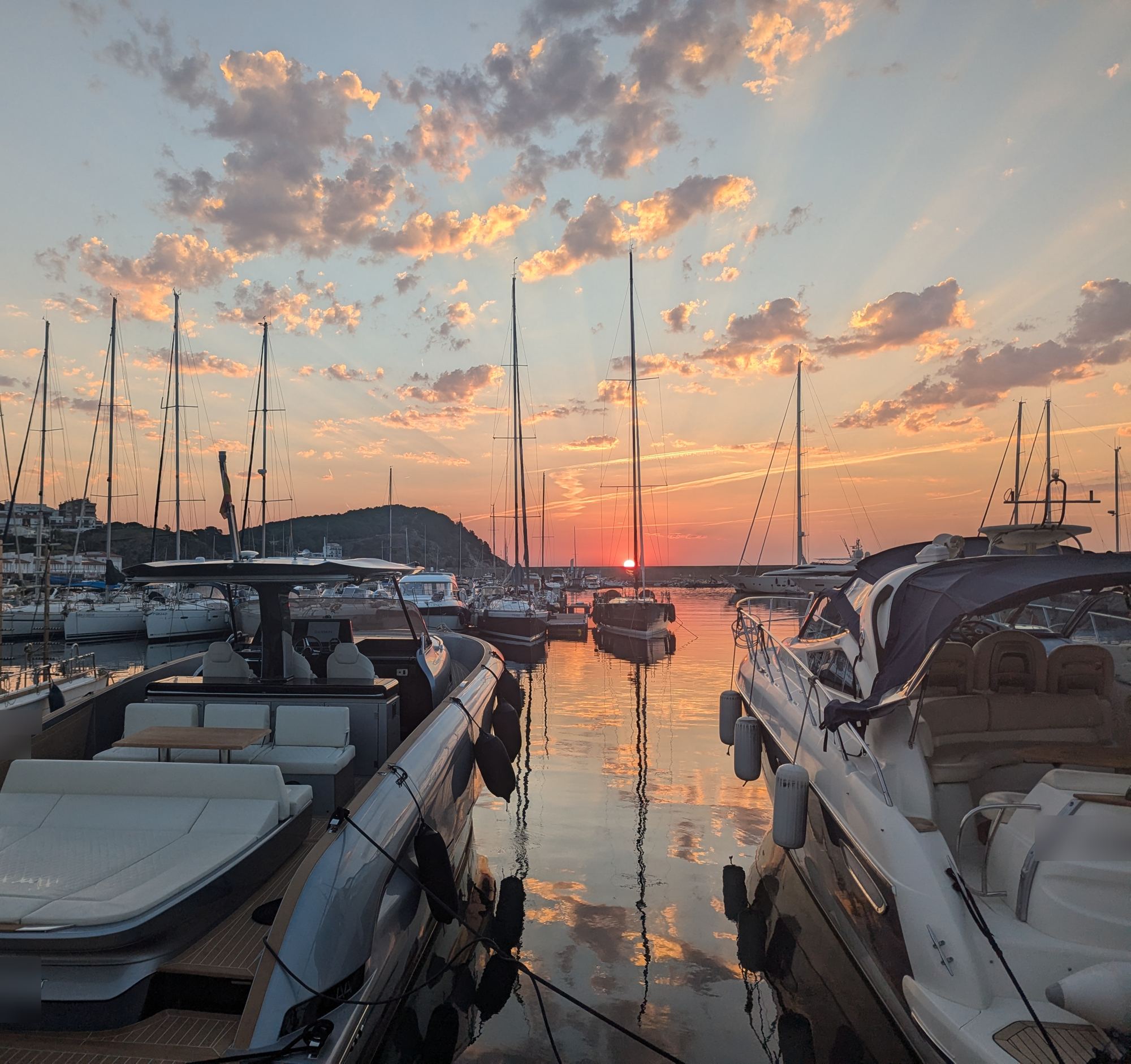 Sunrise in Marina Palamós, with the boat ready at its berth